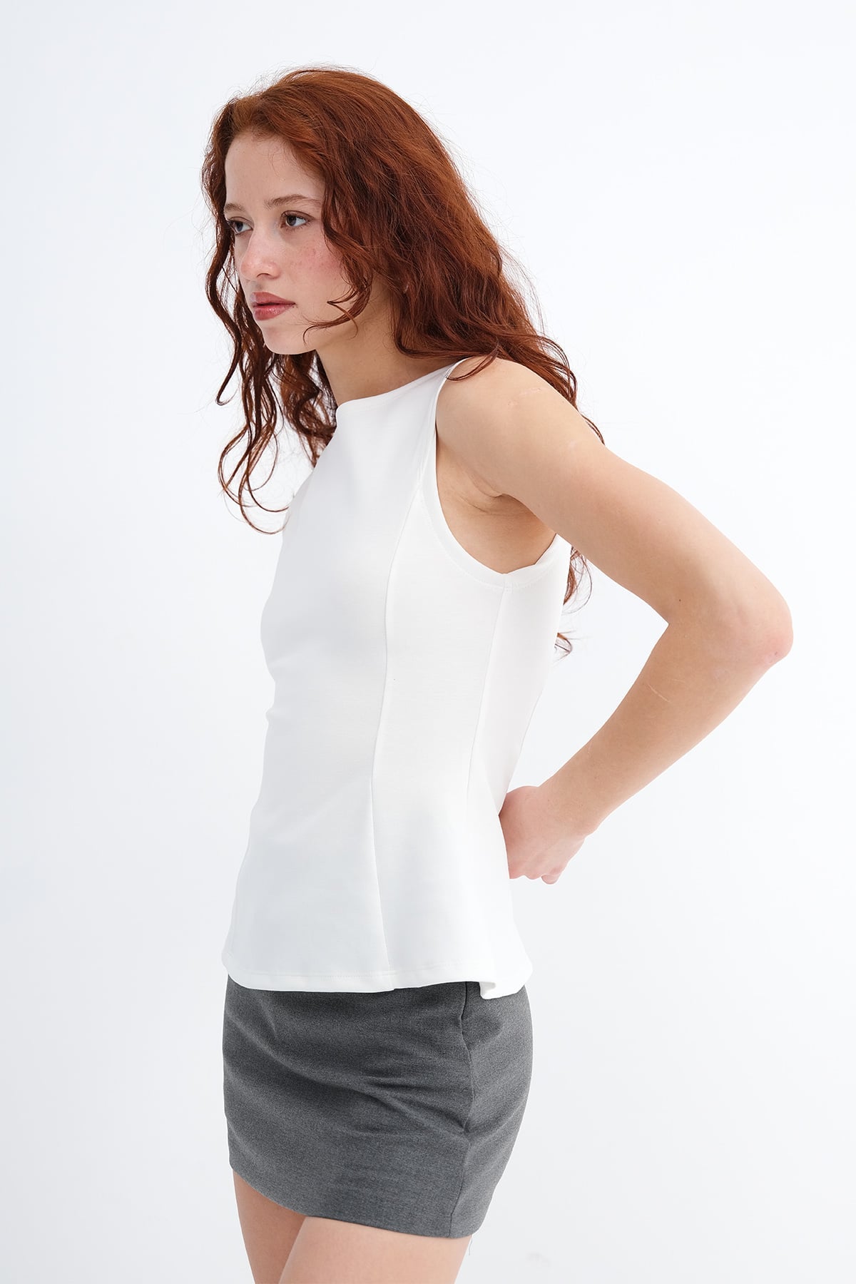 Ecru_Crew-Neck-Peplum-Blouse-addax