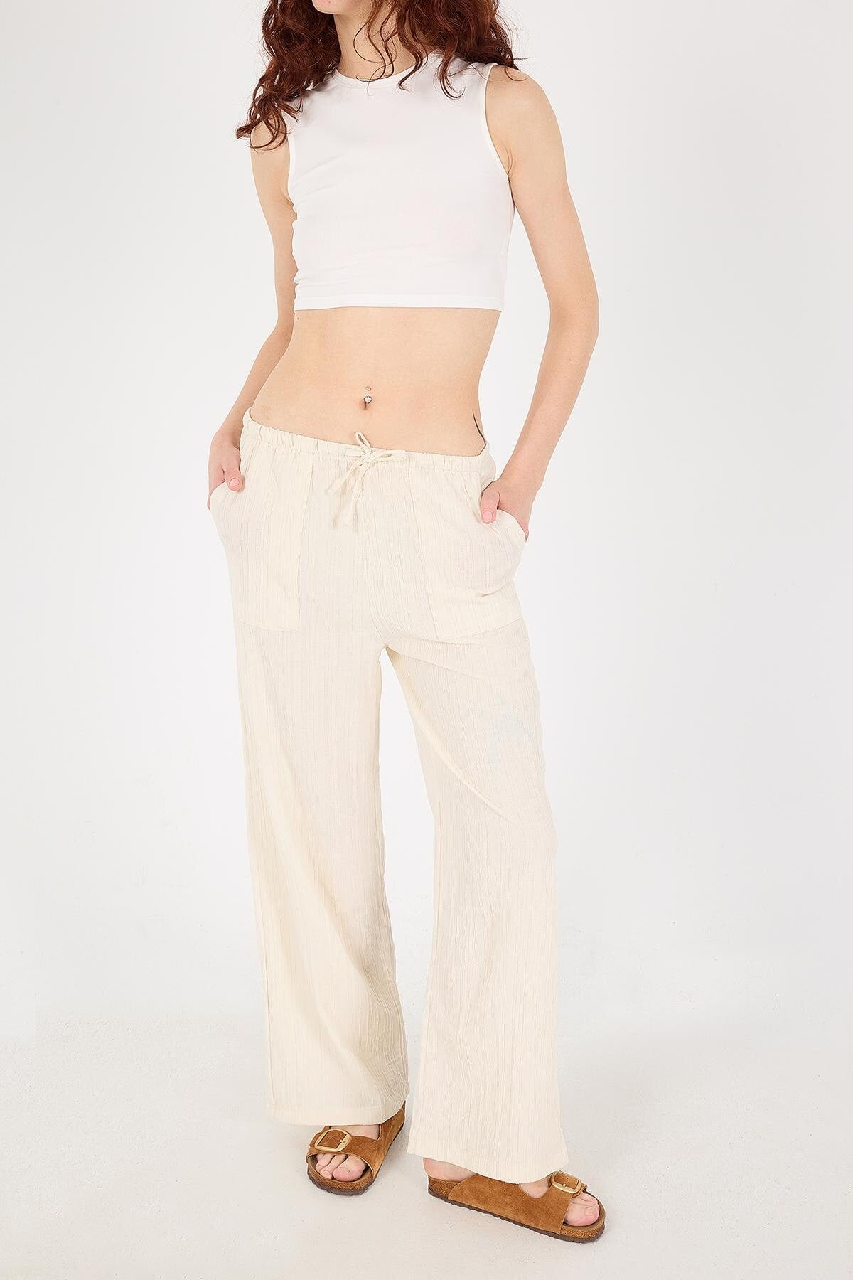 Ecru_Wide-Leg-Trousers-With-Ties-Detail-addax