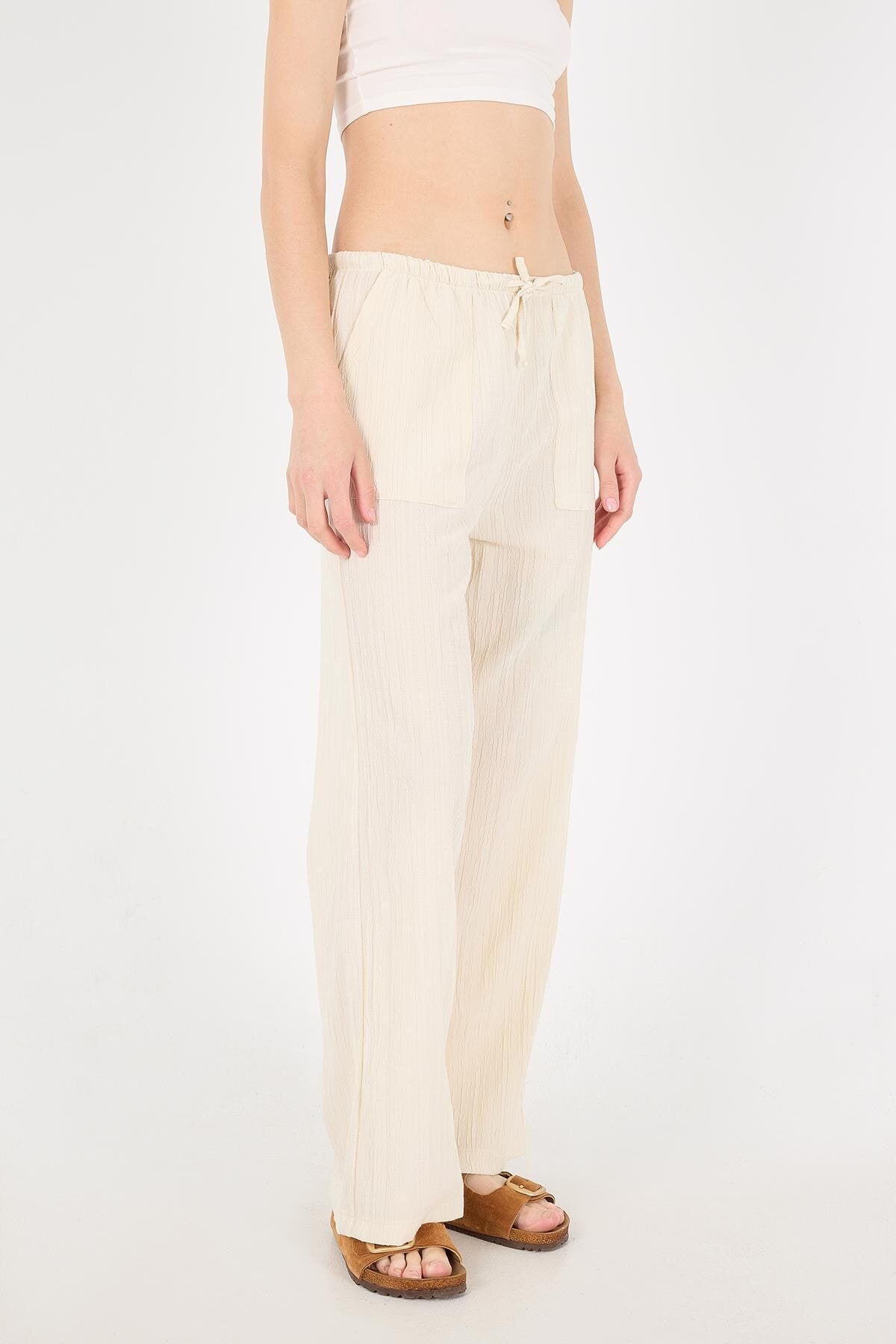 Ecru_Wide-Leg-Trousers-With-Ties-Detail-addax