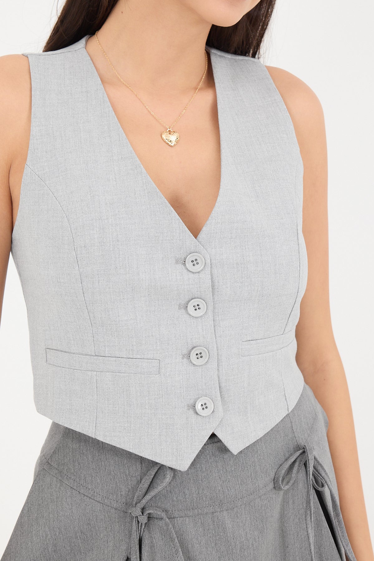Light-Grey_Buttoned-Vest-with-Pocket-Details-addax