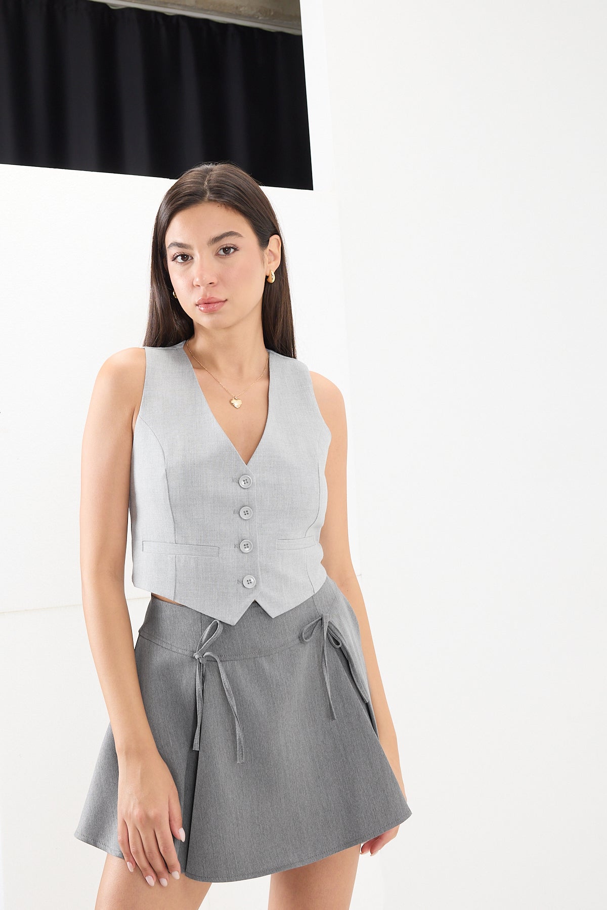 Light-Grey_Buttoned-Vest-with-Pocket-Details-addax