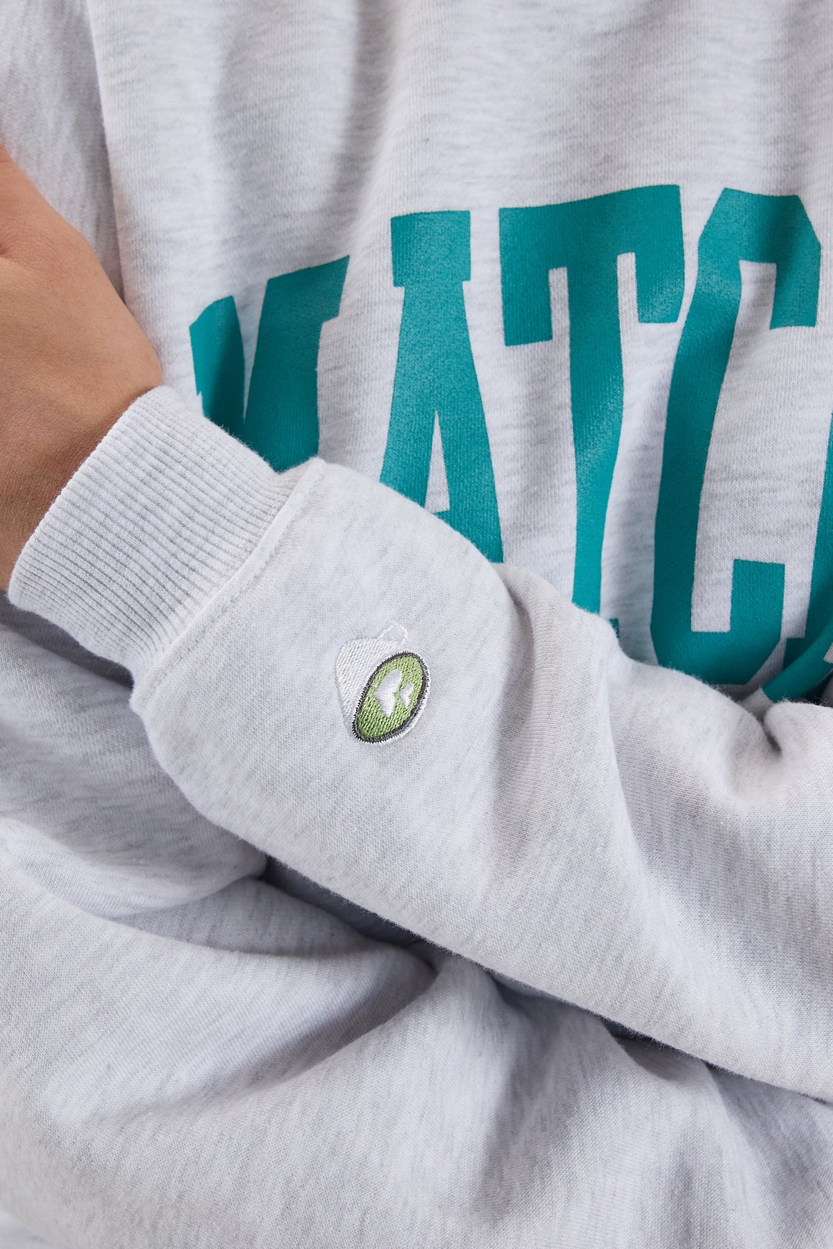 Snow-Melange_“MATCHA”-Printed-Brushed-Sweatshirt-addax