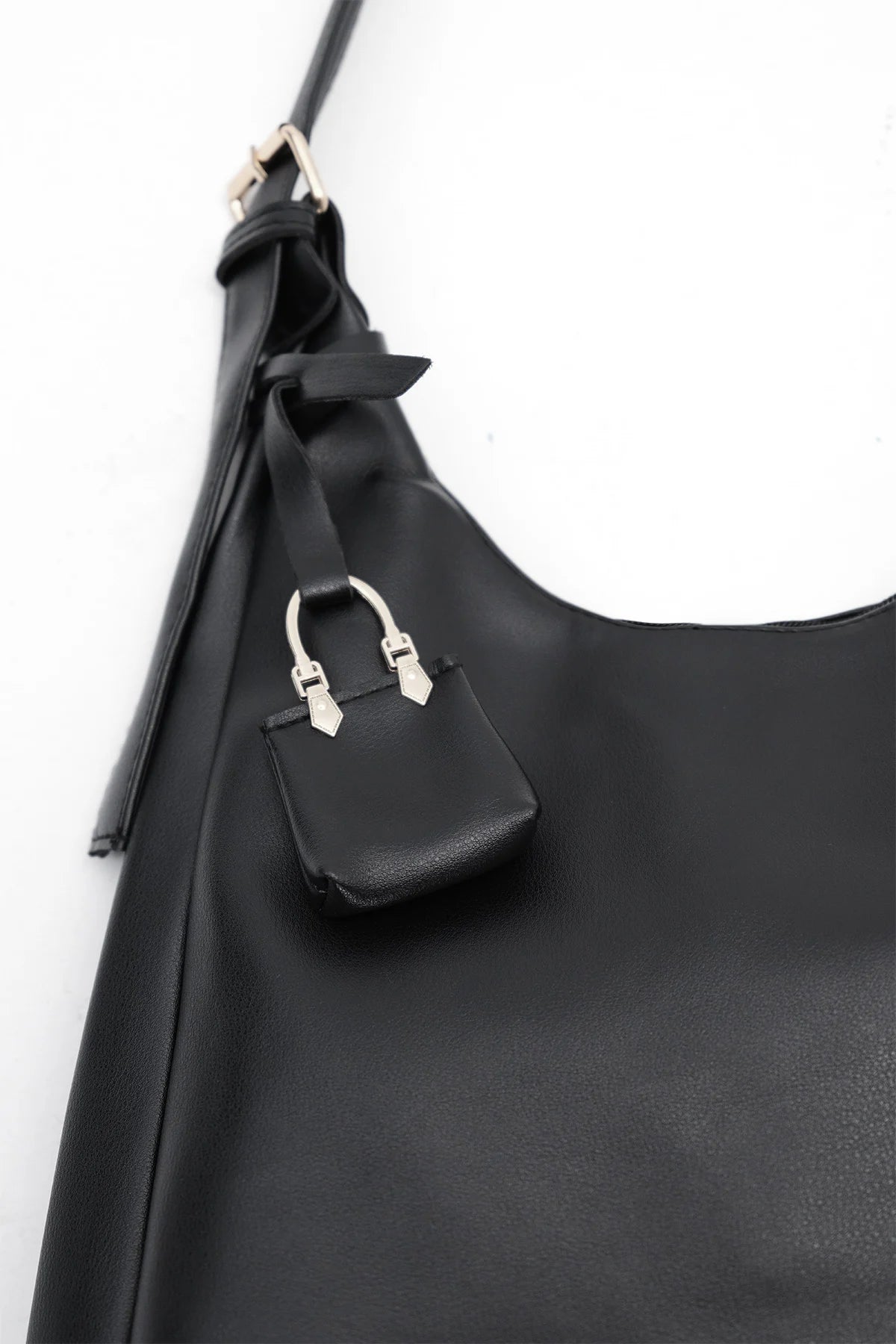 Black_Hand-and-Shoulder-Bag-with-Charms-addax