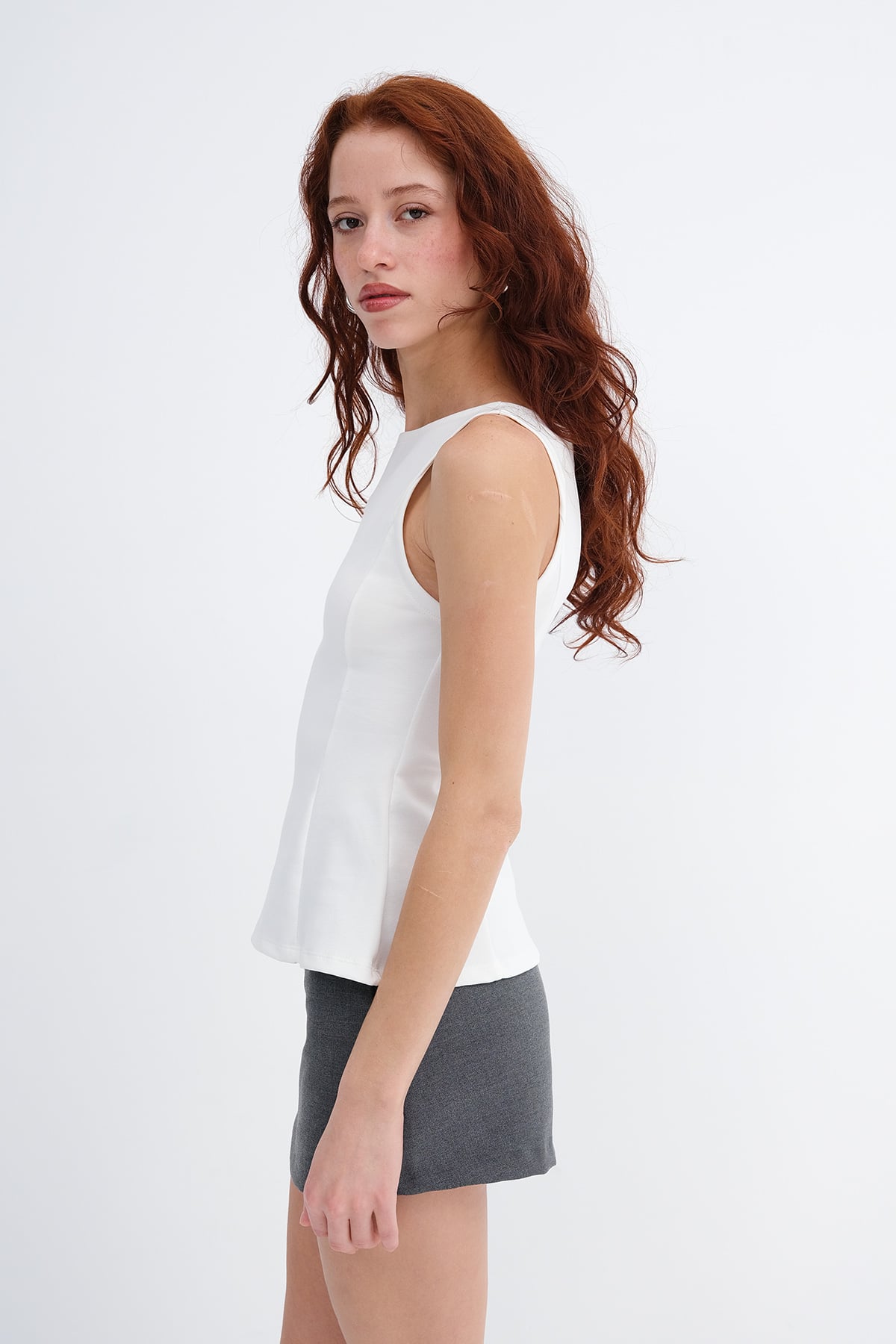 Ecru_Crew-Neck-Peplum-Blouse-addax