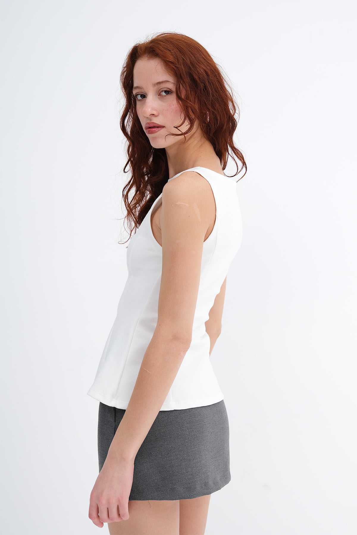 Ecru_Crew-Neck-Peplum-Blouse-addax