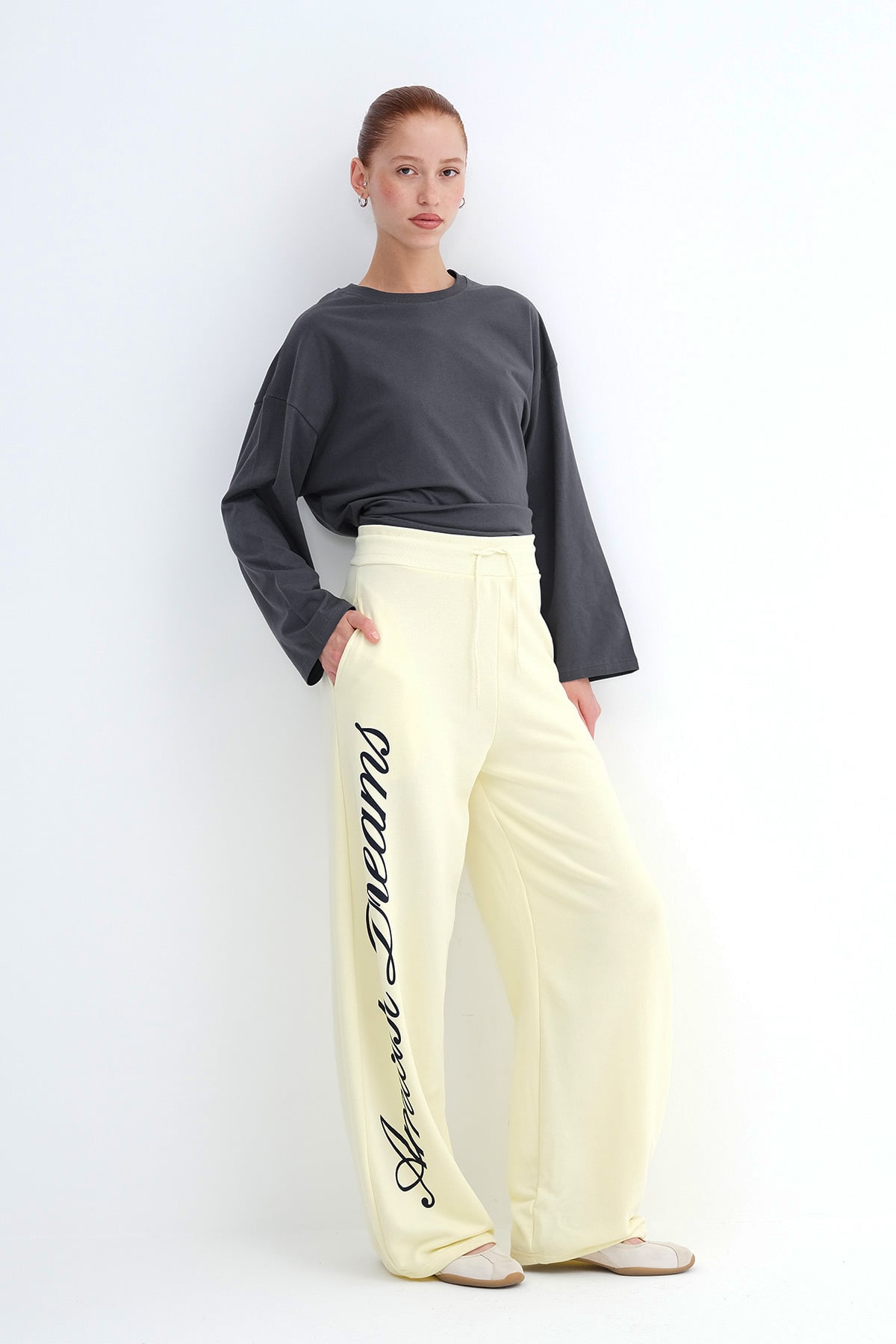 Light-Yellow_Wide-Leg-Sweatpants-with-Text-Print-addax