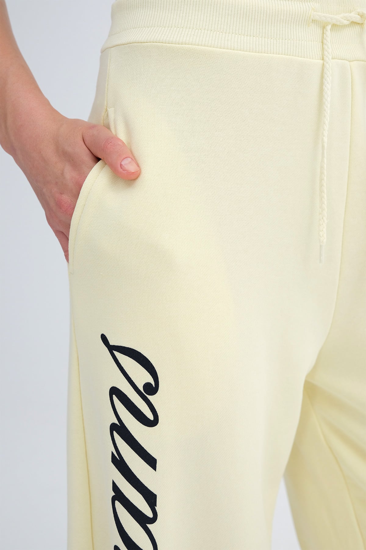 Light-Yellow_Wide-Leg-Sweatpants-with-Text-Print-addax