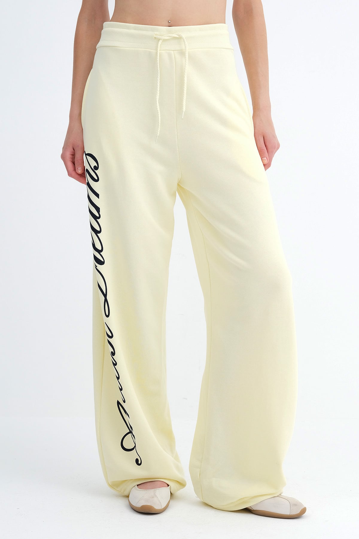 Light-Yellow_Wide-Leg-Sweatpants-with-Text-Print-addax