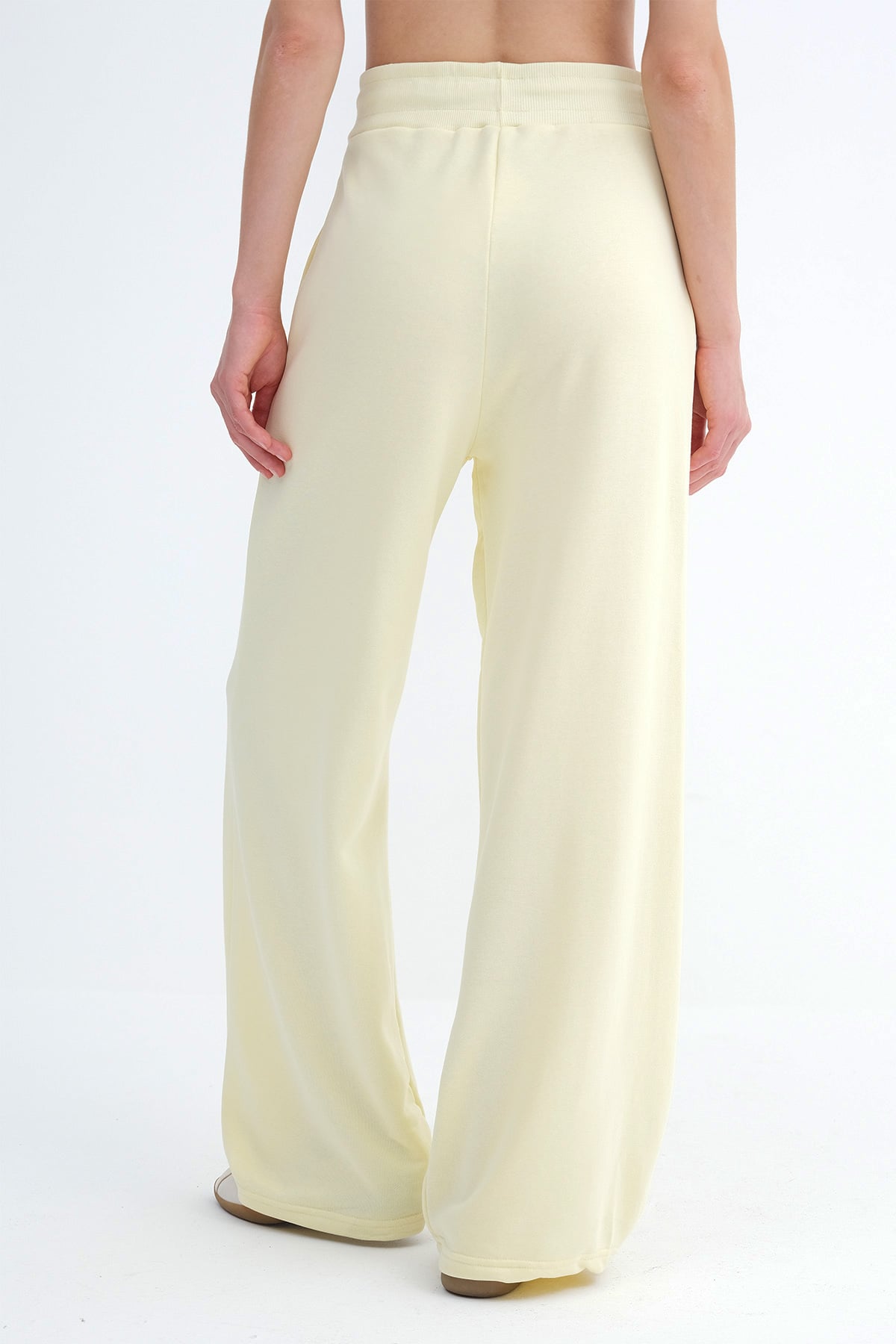 Light-Yellow_Wide-Leg-Sweatpants-with-Text-Print-addax